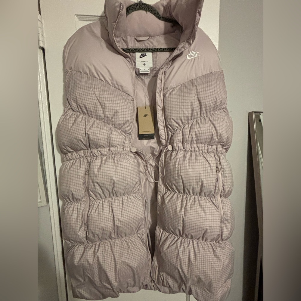 Nike Women's Quilted Puffer Vest in Pale Pink